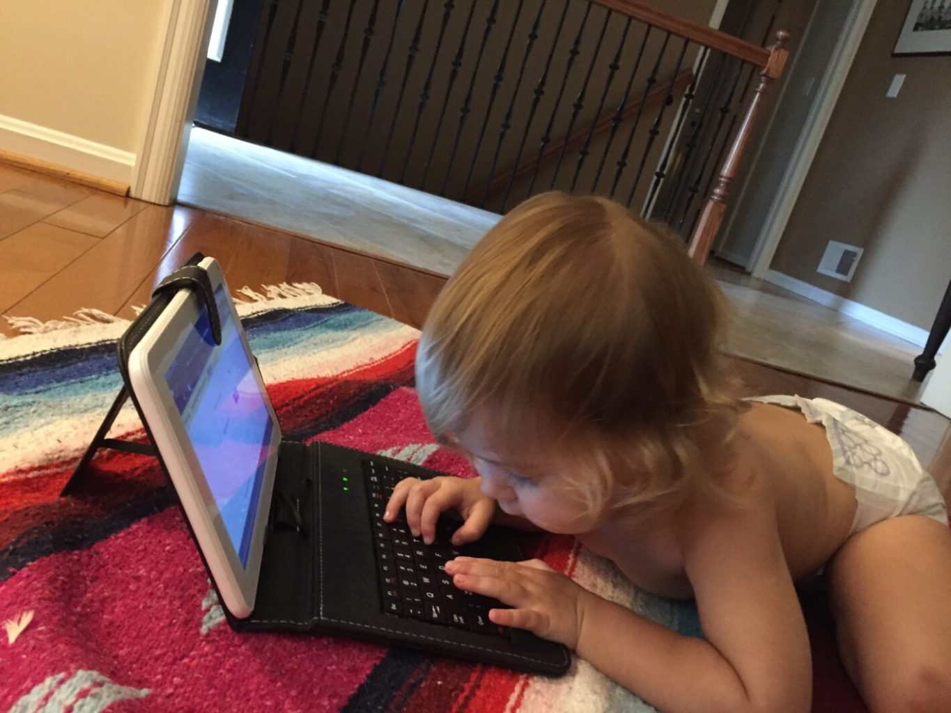 Cecelia writing on her laptop